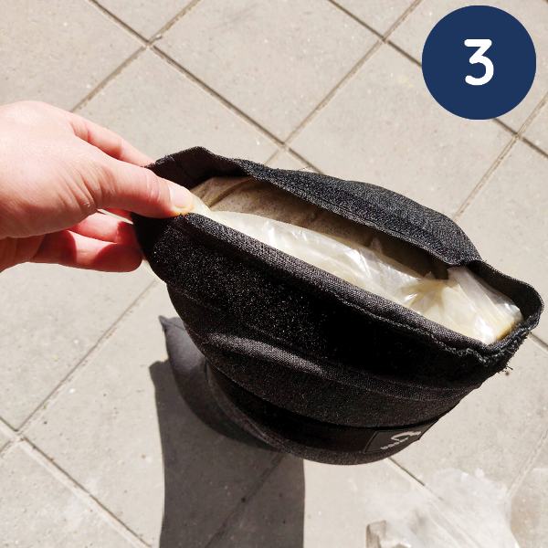 How to fill the Baser sandbags step 3: place the plastic bag inside the sandbag