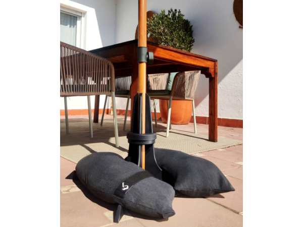 Original patio-umbrella base with sandbags